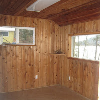 A detached building that originally had no windows. The homeowner was wanting to convert this into an office. We installed new lighting, 7 electrical outlets (for all of the computer components, and 4 new windows. It