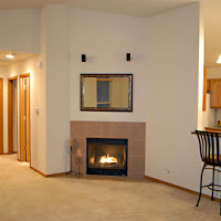 The living area with the kitchen on the right. Two bedrooms and a 2nd bathroom are on the left.