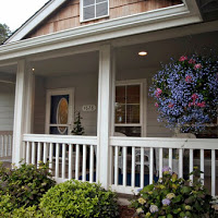 Front entry into house with front porch.