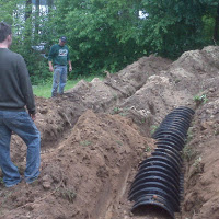 Stopped to take a look at the placement and depth of the new drain field.